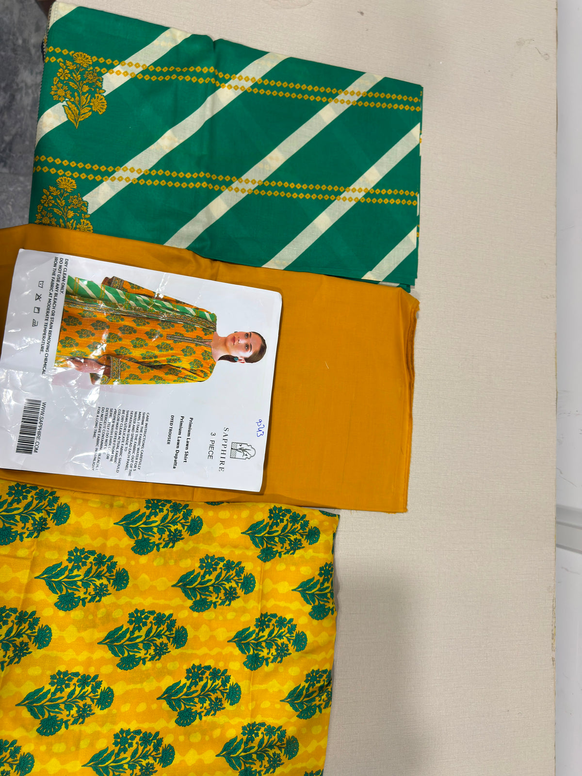 Yellow Floral Motif Kameez with Striped Leheriya Dupatta 3-Piece Suit